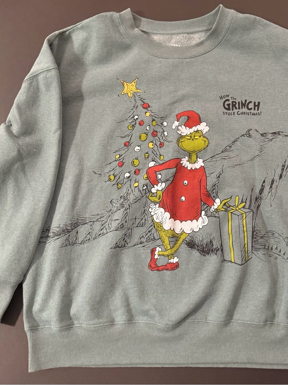 Hybrid Apparel Women’s Grinch Sweatshirt in Sage Green with Red & Yellow Accents